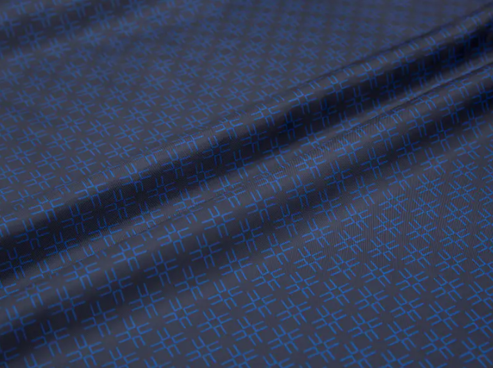 なぜデザイナーはオールポリスターのツイルプリントライニング生地を好むのですか？